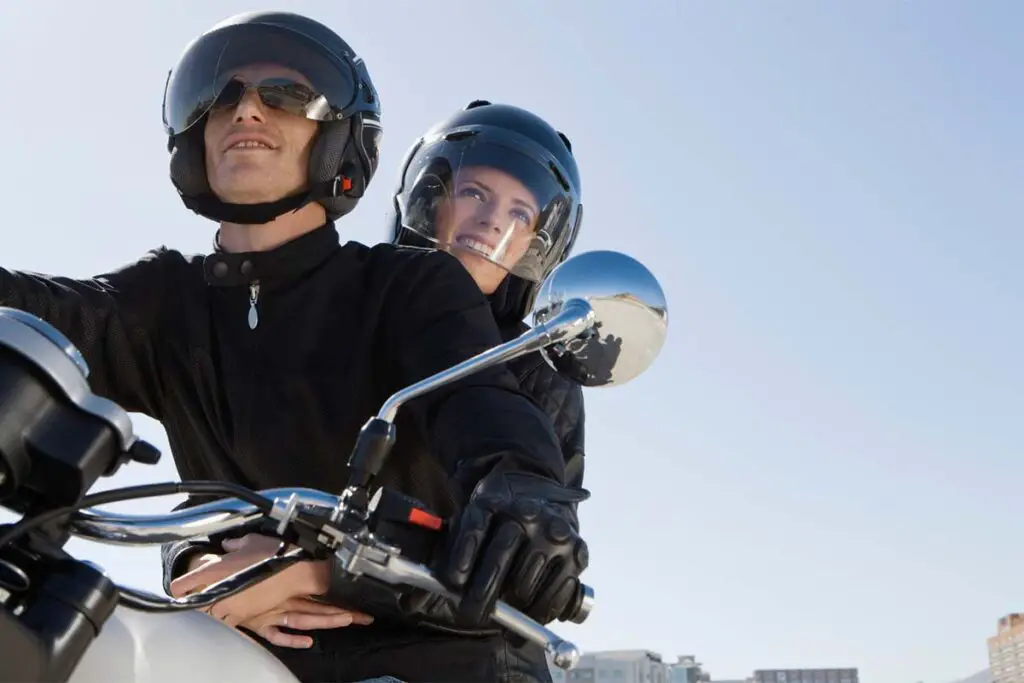 Couple Riding Motorcycle