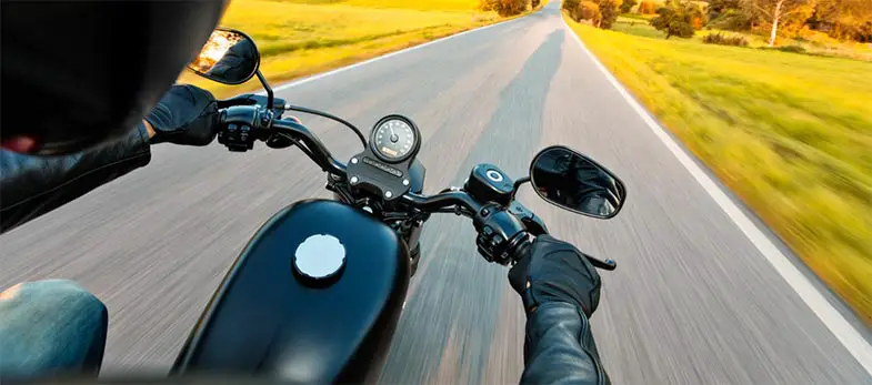 Motorcycle Driver Riding on Motorway