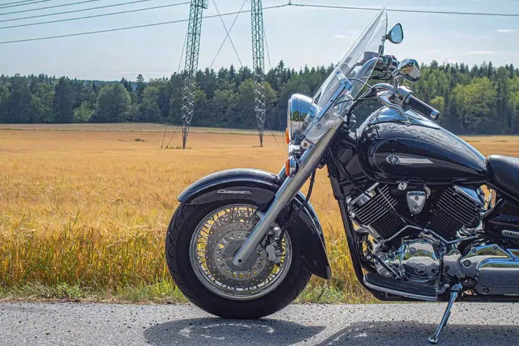 Black Yamaha Motorcycle Next to a Field