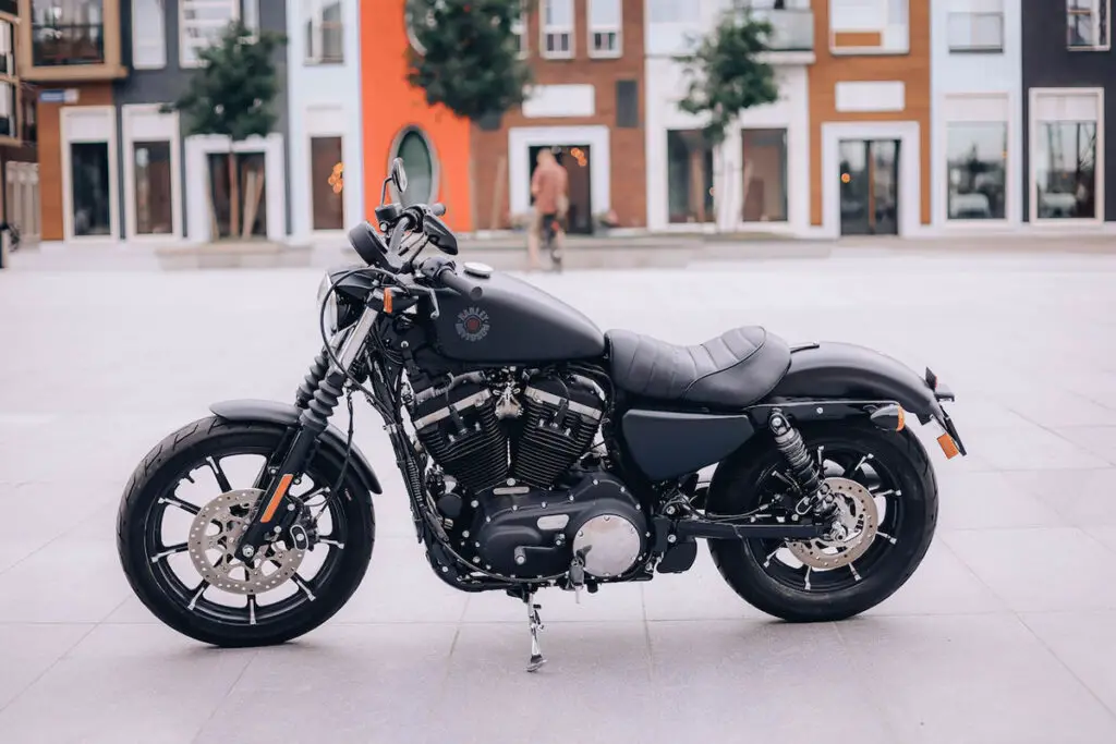 Black Harley Davidson Parked Near Buildings