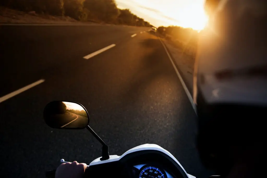 Person Riding a Motorcycle on the Highway