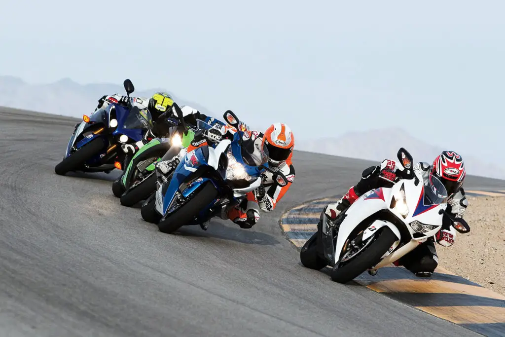 Group of People Racing Motorcycles
