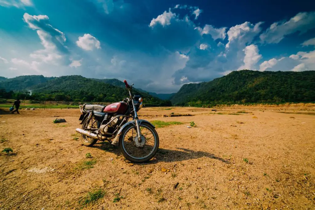 Red and Black Yamaha RX100 Motorcycle