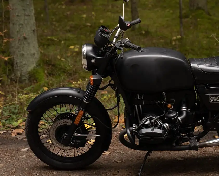 Black BMW Motorcycle Parked Near the Forest